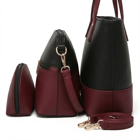 Black and maroon handbag set with a shoulder strap on a white background